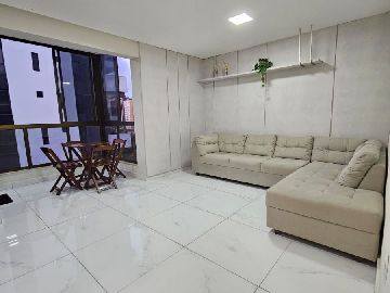 sala de estar com varanda intergrada