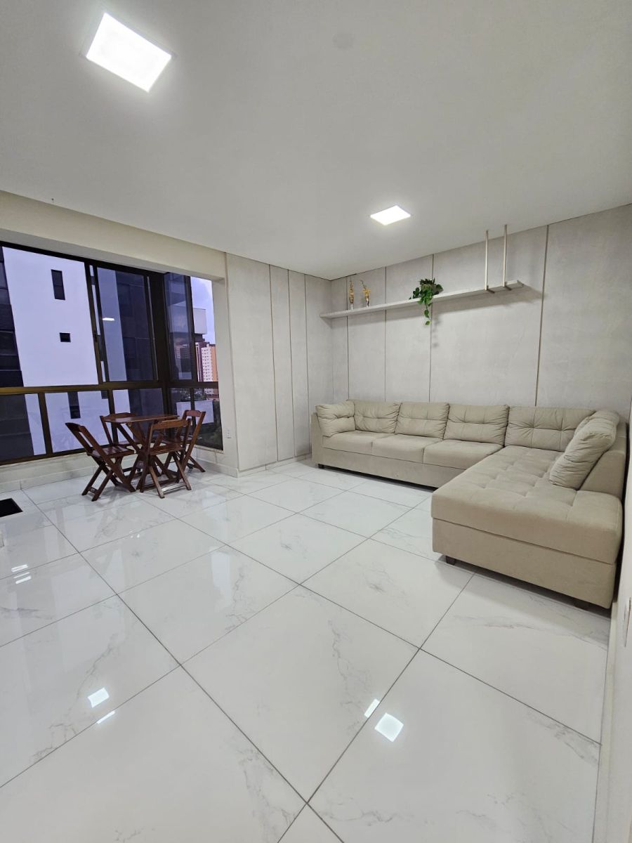 sala de estar com varanda intergrada